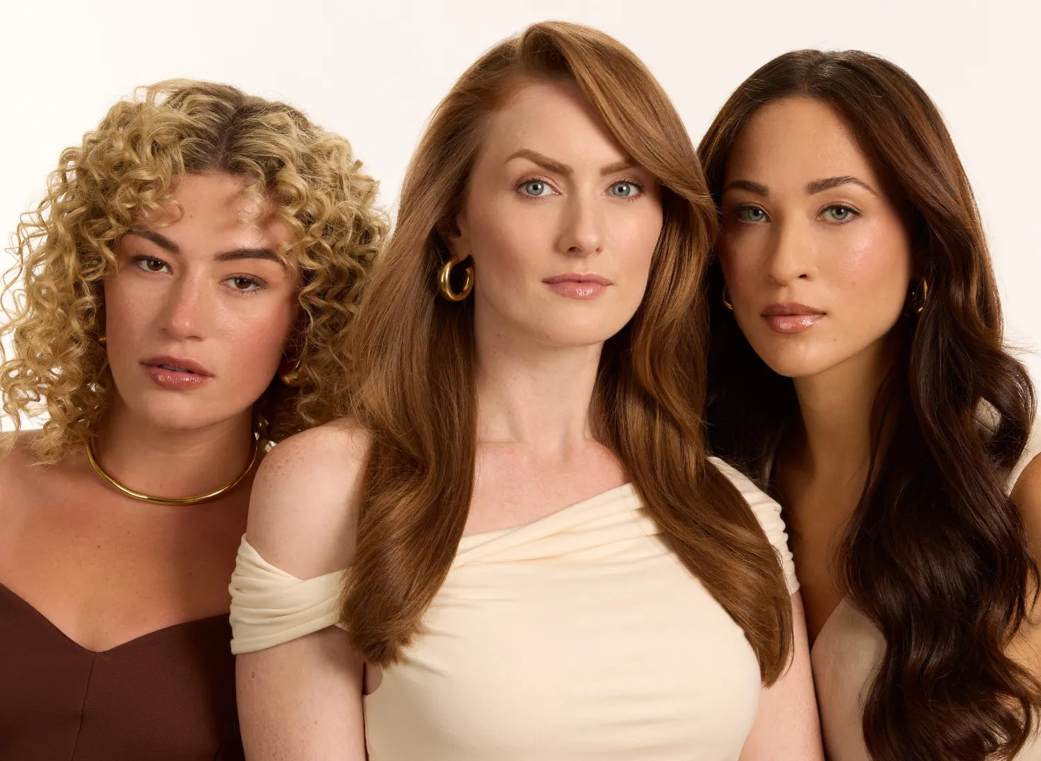 Drei Frauen mit unterschiedlichen Haarlooks